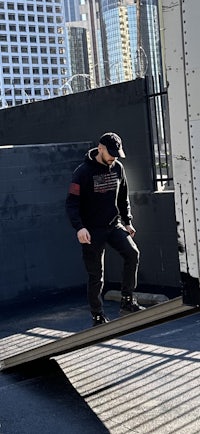 a man on a skateboard in front of a building